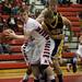 Milan junior Jacob Novak looks to pass against Chelsea defenders on Friday. Milan won 71-40. Daniel Brenner I AnnArbor.com